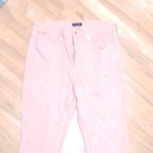 Light pink boot leg jeans.